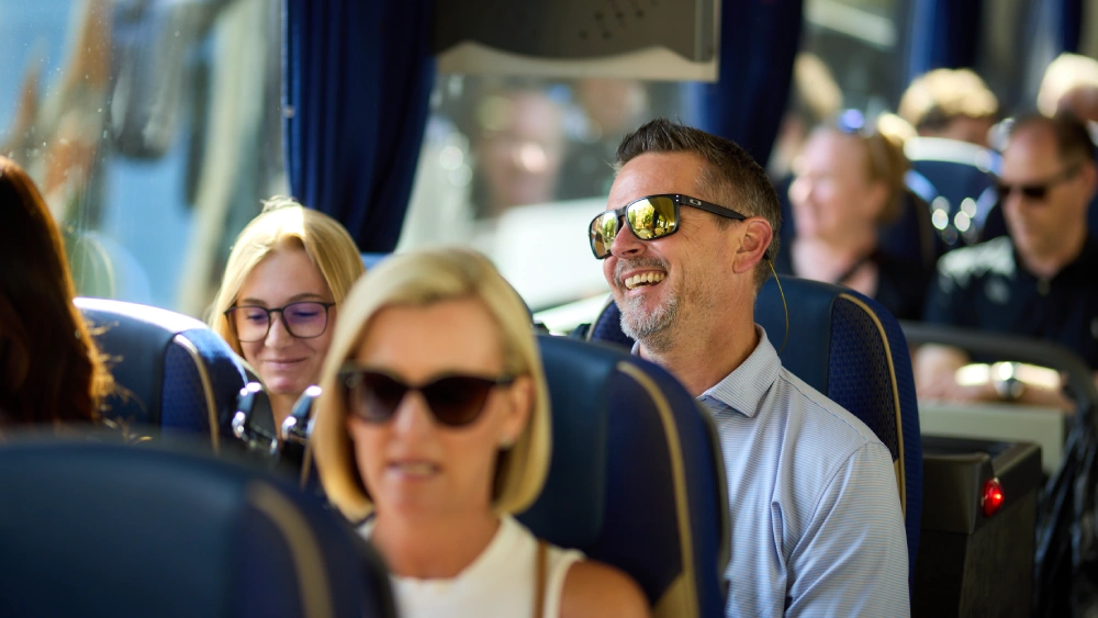 Passengers travelling on an Anderson Travel coach Passengers travelling comfortably on an Anderson Travel coach
